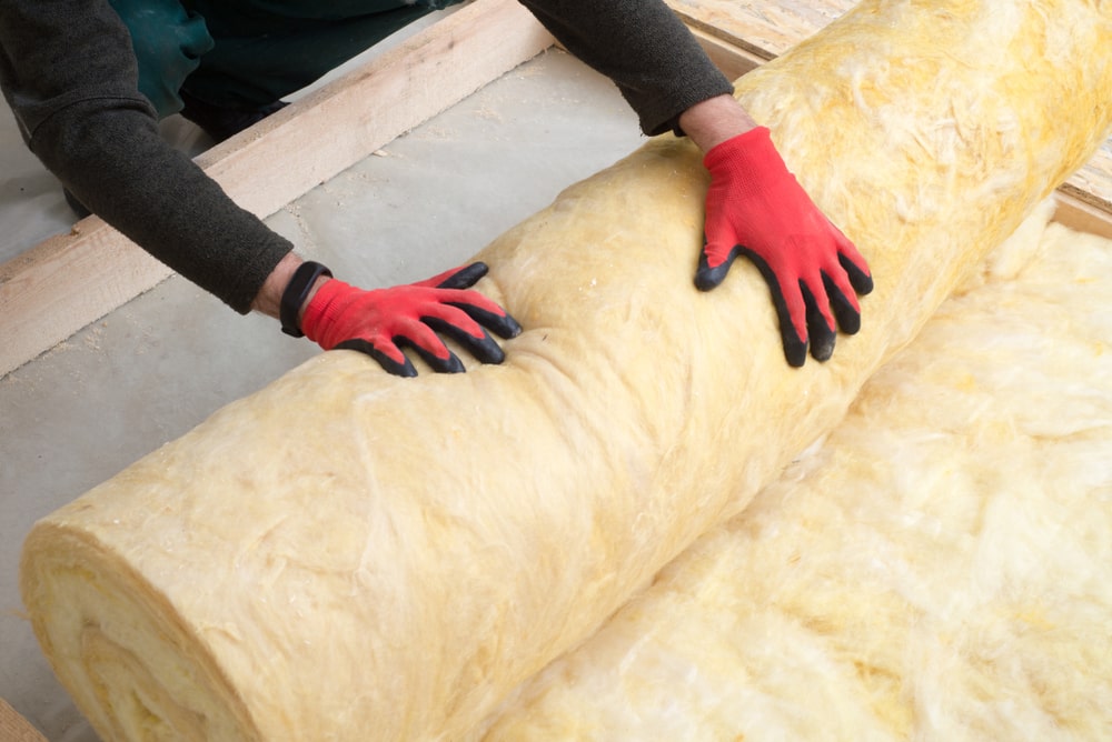 A professional rolling fiberglass - 7 Types Of Insulation We Offer At La Place Insulation