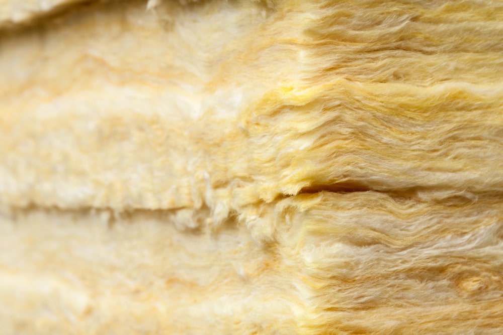 Mineral Wool Insulation Close-up: Detailed view of mineral wool, highlighting its thermal insulating features for home use.