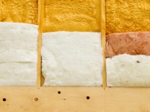 Different types of building insulation: Open Cell spray foam and fiberglass mats - Insulation in New Orleans